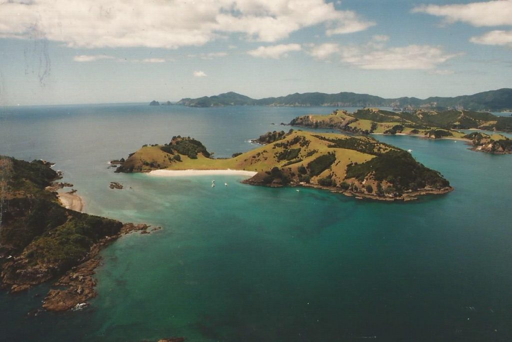 rugged islands with white sand beaches and a blue sea